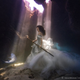 Illustration for article titled This Shark Shepherdess Looks Like She Stepped Out of an Underwater Fairy Tale